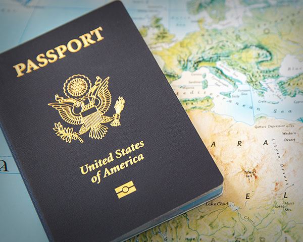 Passport laying on map