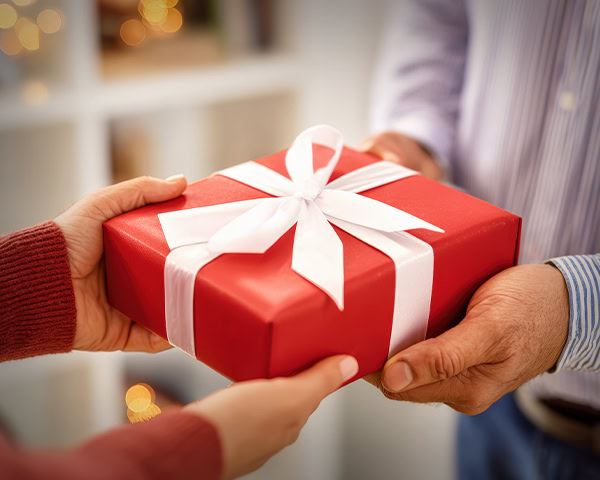 Handing a holiday gift