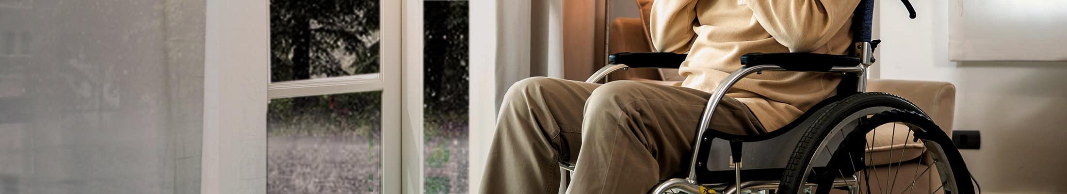 senior looking out during a storm